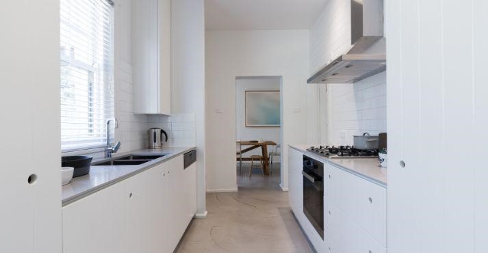 Galley-kitchen-design-in-white-finishings