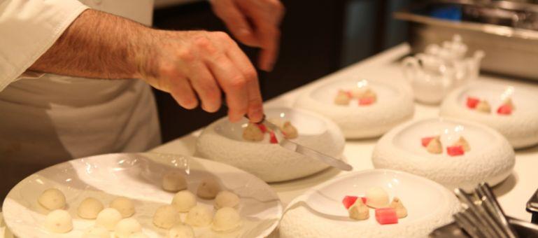 chef-prepping-meal-service-in-michelin-start-restaurant